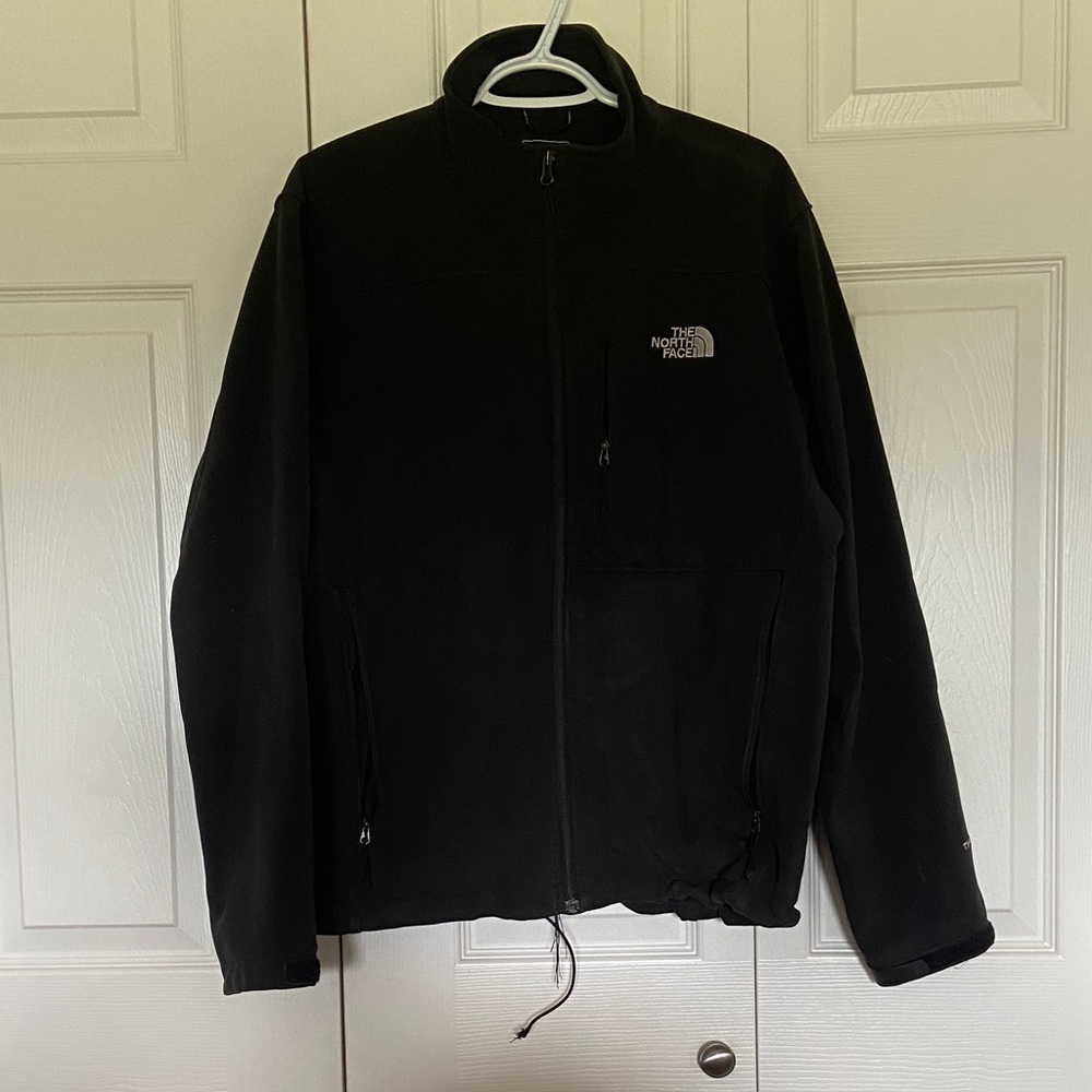 The North Face Classic Black Jacket with some damage on strings